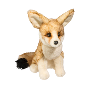 Plush toy fox sitting on a white background