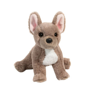 Plush toy dog with brown and white fur on a white background