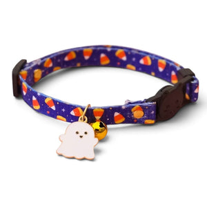 A blue pet collar with a candy pattern, featuring a white ghost charm and a small gold bell, shown on a white background.