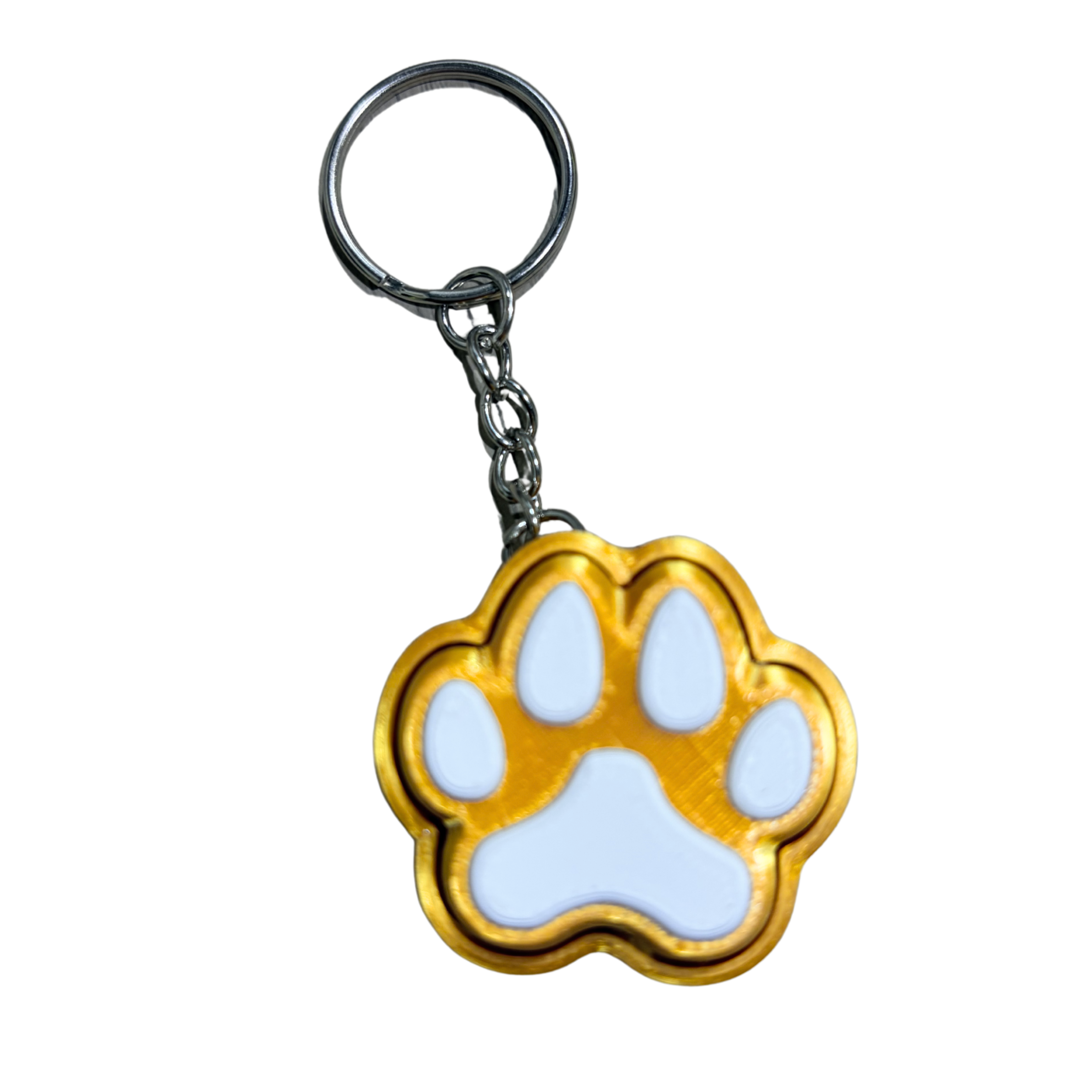 Gold paw print keychain on a white background