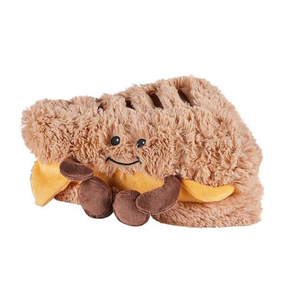 Plush toy resembling a hot dog with a face on a white background