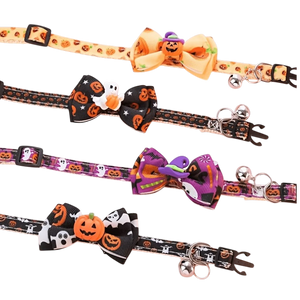 Four Halloween-themed pet collars with matching bow accessories, displayed diagonally on a white background. The collars feature various spooky patterns including jack-o'-lanterns, ghosts, bats, and a witch's hat, with silver bells attached.