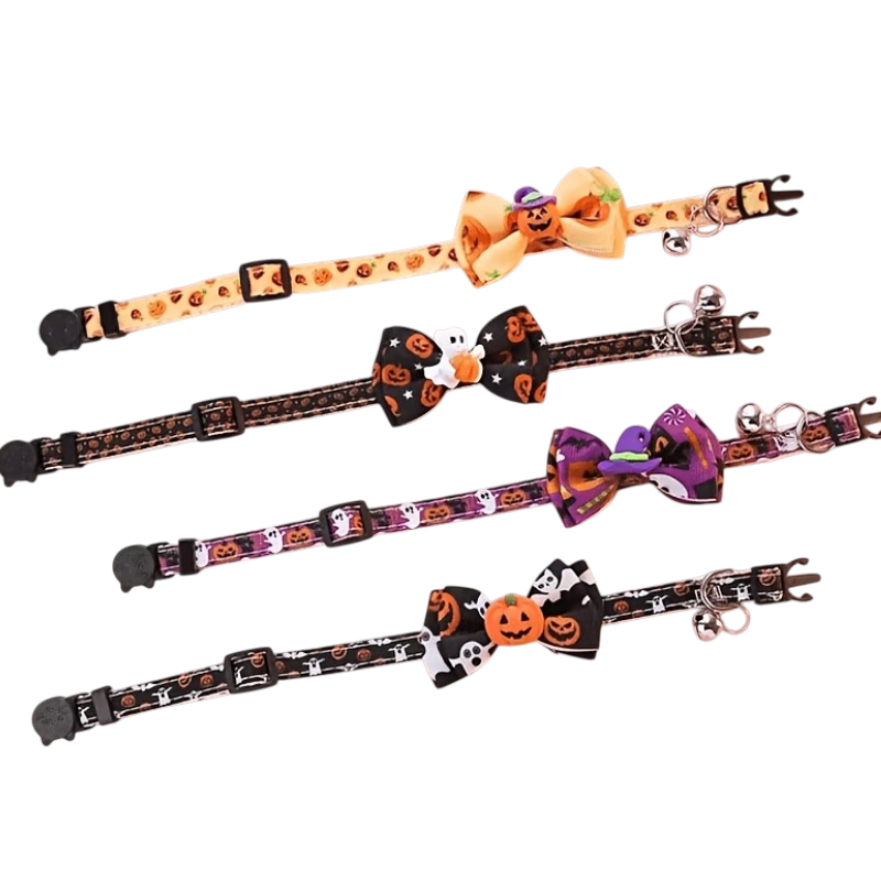 Four Halloween-themed pet collars arranged diagonally on a white background, each featuring a decorative bow and printed patterns of pumpkins, skulls, ghosts, and spiderwebs.