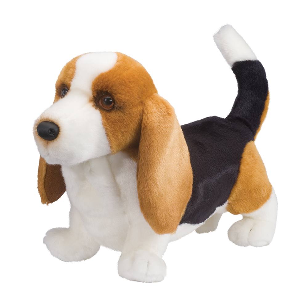 Plush toy dog with brown, black, and white fur on a white background