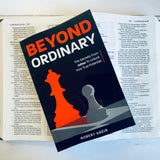 Beyond Ordinary. The secrets from Jabez to unlock your true potential paperback book sitting on top of the bible