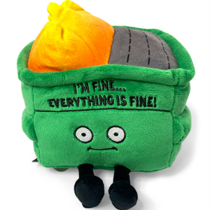 A green plush toy shaped like a trash bag with a face, black legs, a yellow and orange top, and embroidered text reading 'I'M FINE.
