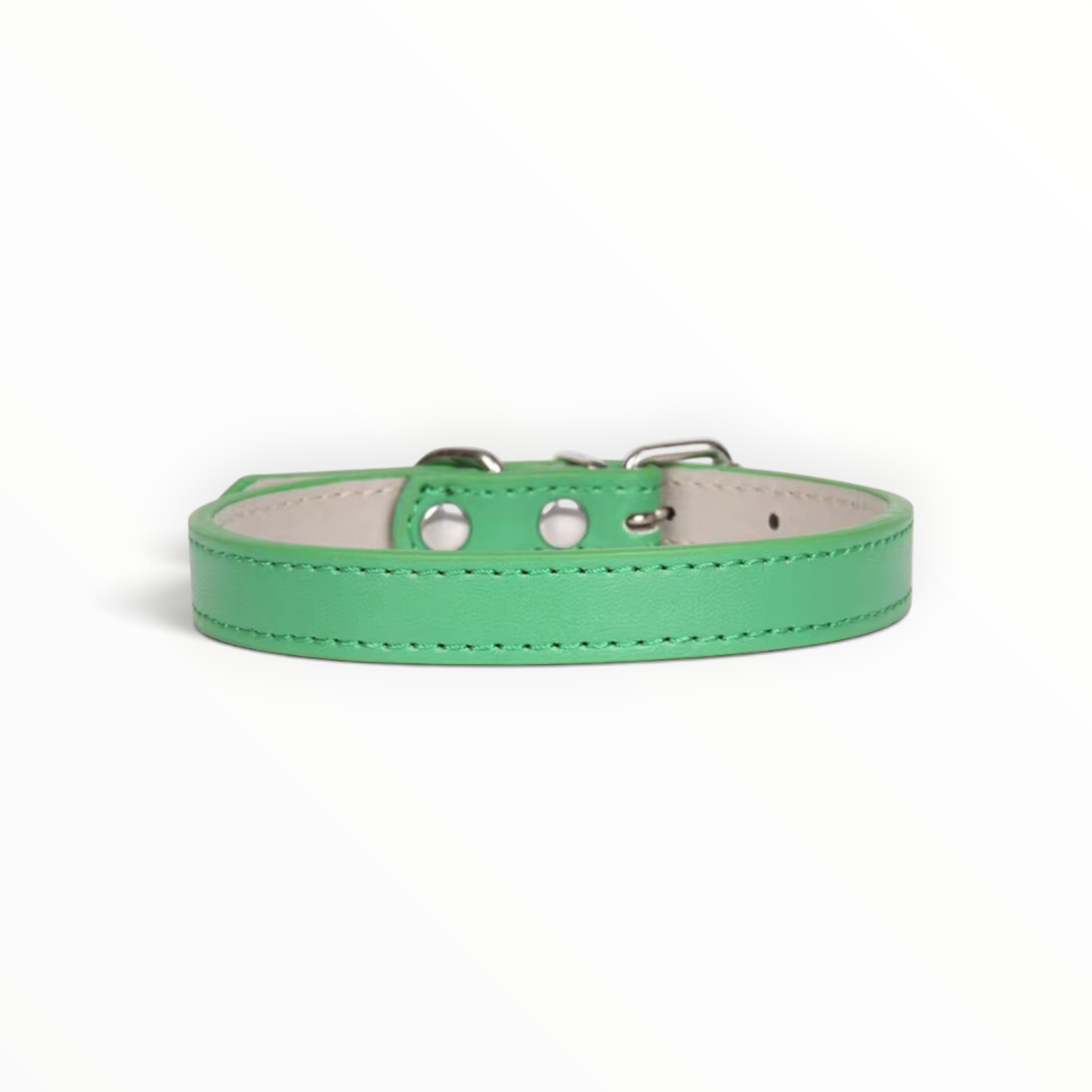 A green leather dog collar with silver-tone metal hardware and a light beige interior, shown on a clean white background.