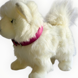 A fluffy white faux-fur dog toy wearing a bright pink collar, shown against a plain white background.