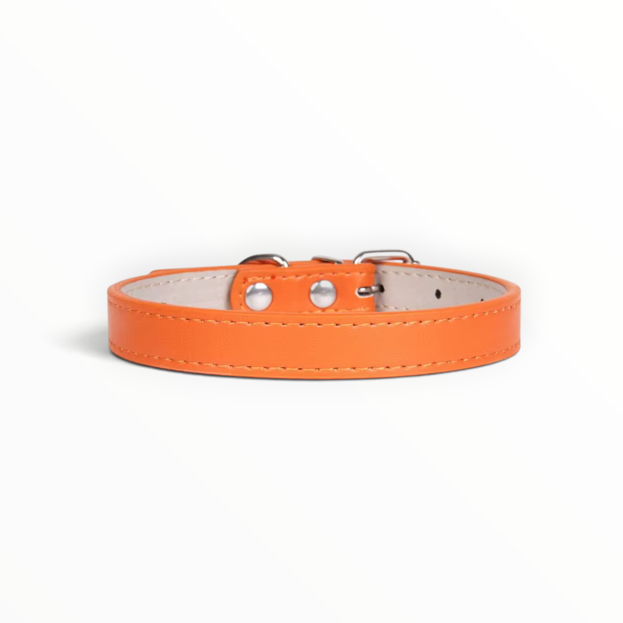 A orange leather dog collar with silver metal hardware and white stitching, shown against a plain white background.