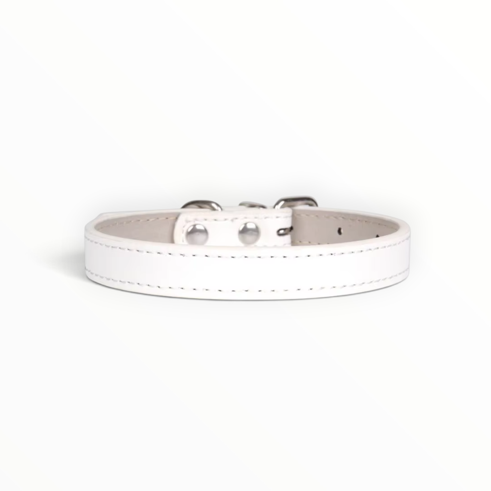 A white leather collar with silver-tone metal hardware and stitching, displayed on a clean white background.