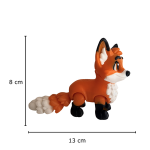 Toy fox figure with measurements on a white background