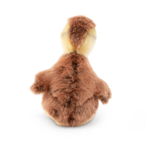 Stuffed animal toy with brown and yellow fur on a white background