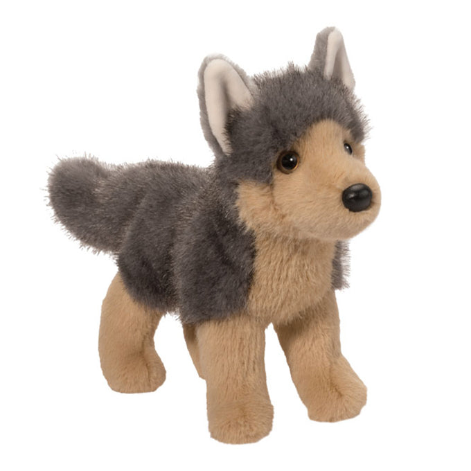 Plush toy wolf on a white background