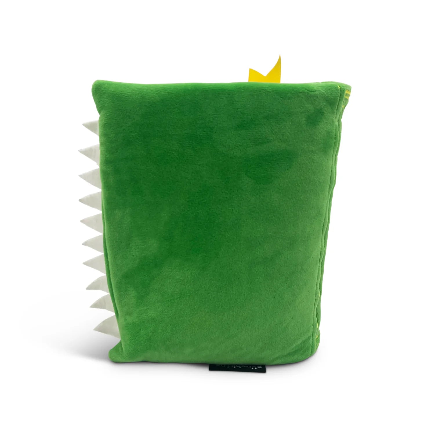 Green dinosaur-shaped pillow with a yellow crown on a white background
