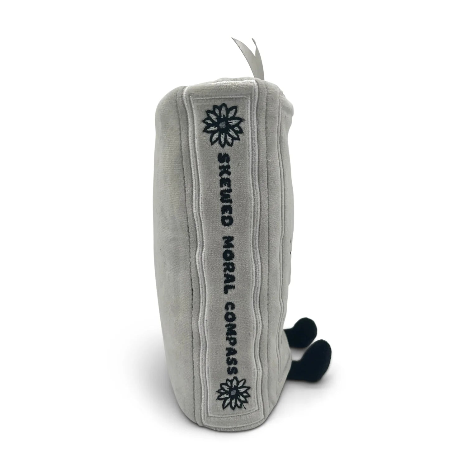 Gray plush toy with 'Skewed Moral Compass' text and logo on a white background