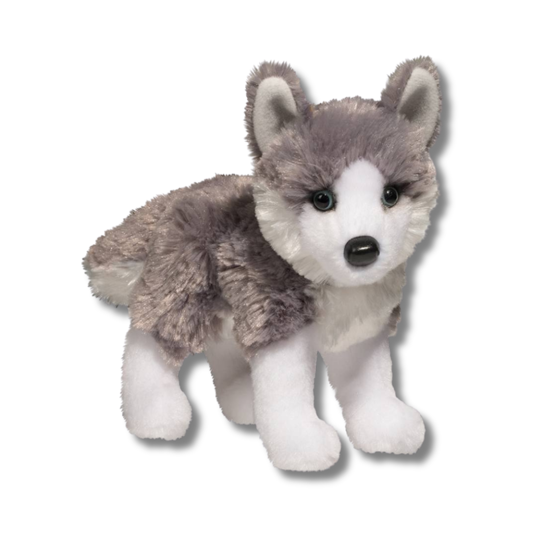 Plush toy wolf on a white background