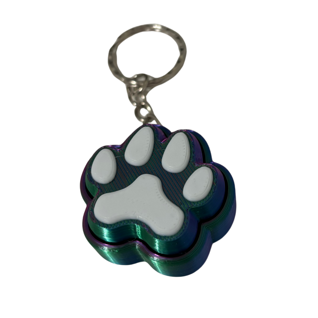 Keychain with paw print design on a white background