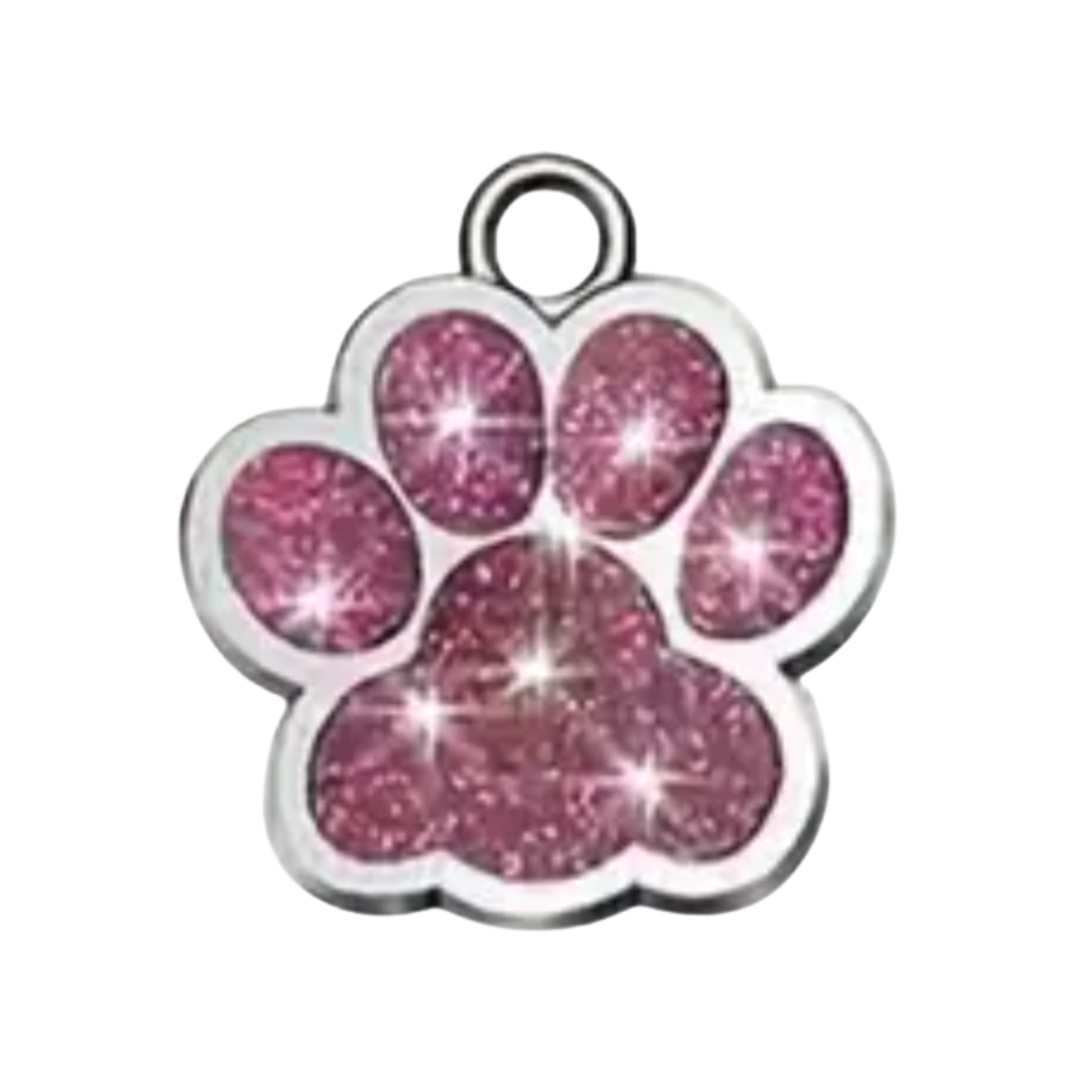 Pink glittery paw print charm on a white background