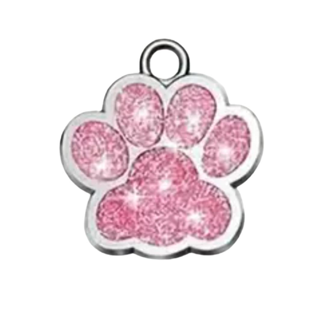 Pink glittery paw print charm on a white background