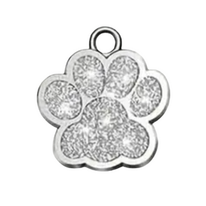 Silver paw print charm on a white background