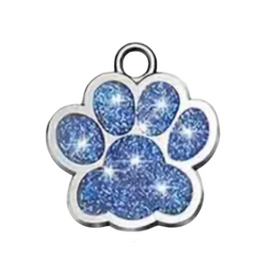 Blue glittery paw print charm on a white background