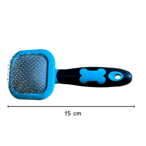 Pet grooming brush with blue handle and black bristles, measurement indicated.