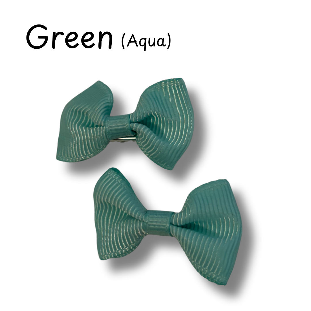 Two green hair bows on a white background with 'Green (Aqua)' text above.