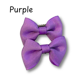 Purple hair bow on a white background with the word 'Purple' above it.