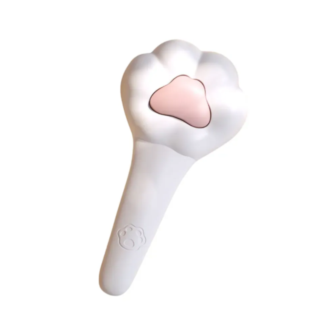White handheld device with a pink heart-shaped component on a white background