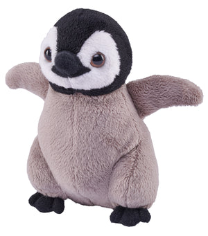 Plush toy penguin on a white background