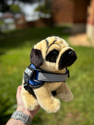Pug Plush dog by Living Nature wearing Blue essa gear. Emotional Support harness.