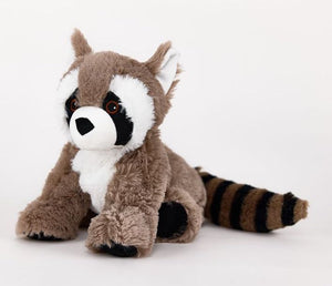 A plush raccoon toy sitting on a plain white studio background. The stuffed animal has brown fur, a white chest and face markings, black eye patches and nose, and a brown-and-black striped tail.