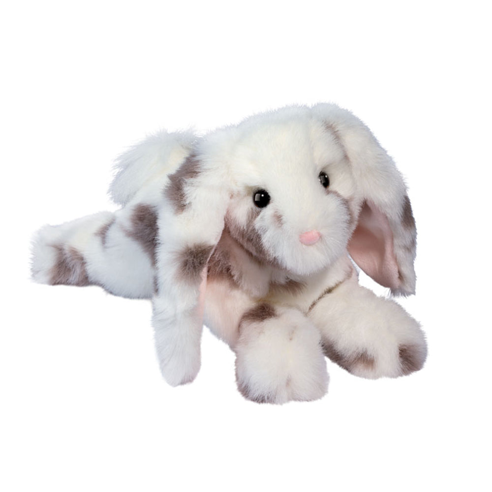 Plush toy dog with brown spots on a white background