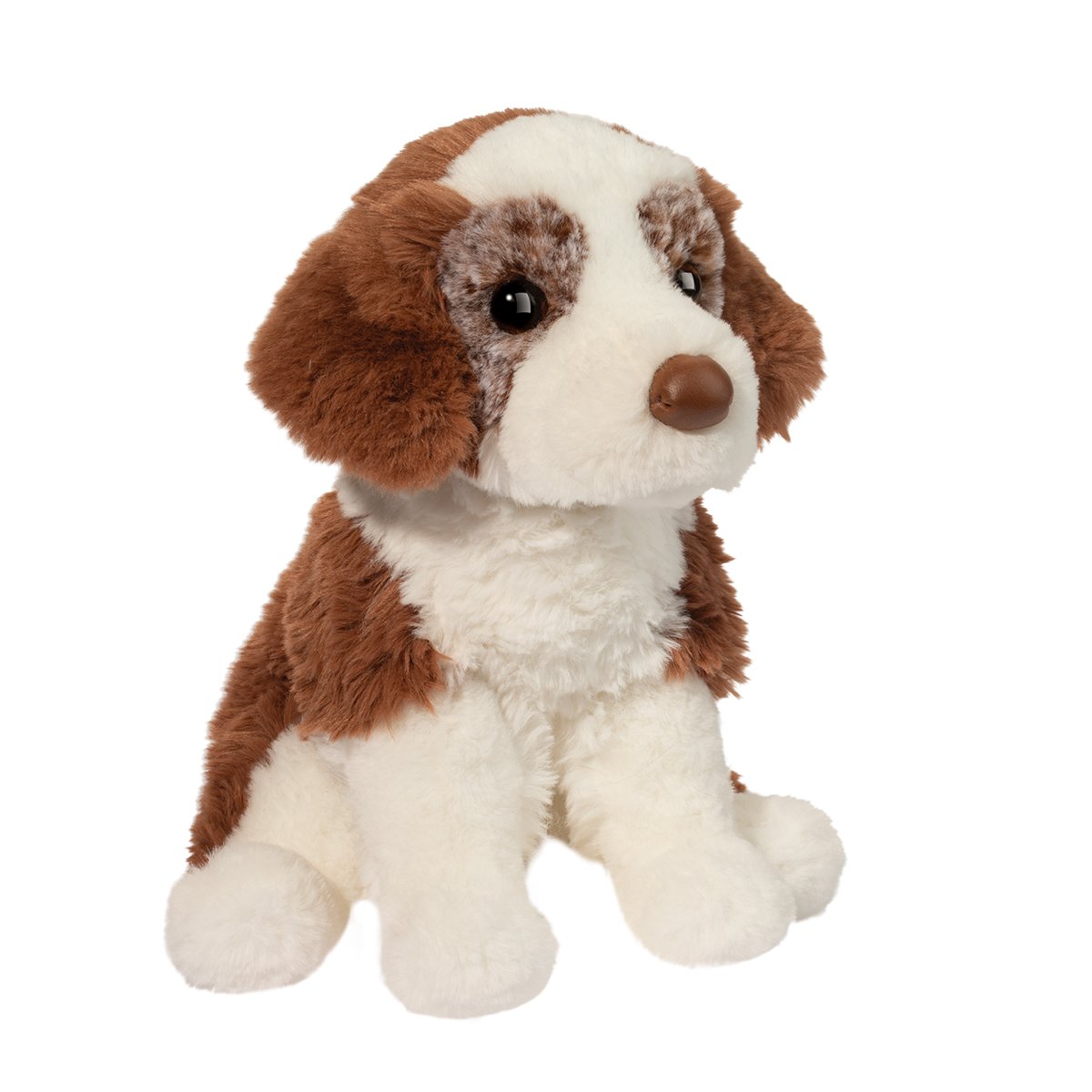 Plush toy dog with brown and white fur on a white background