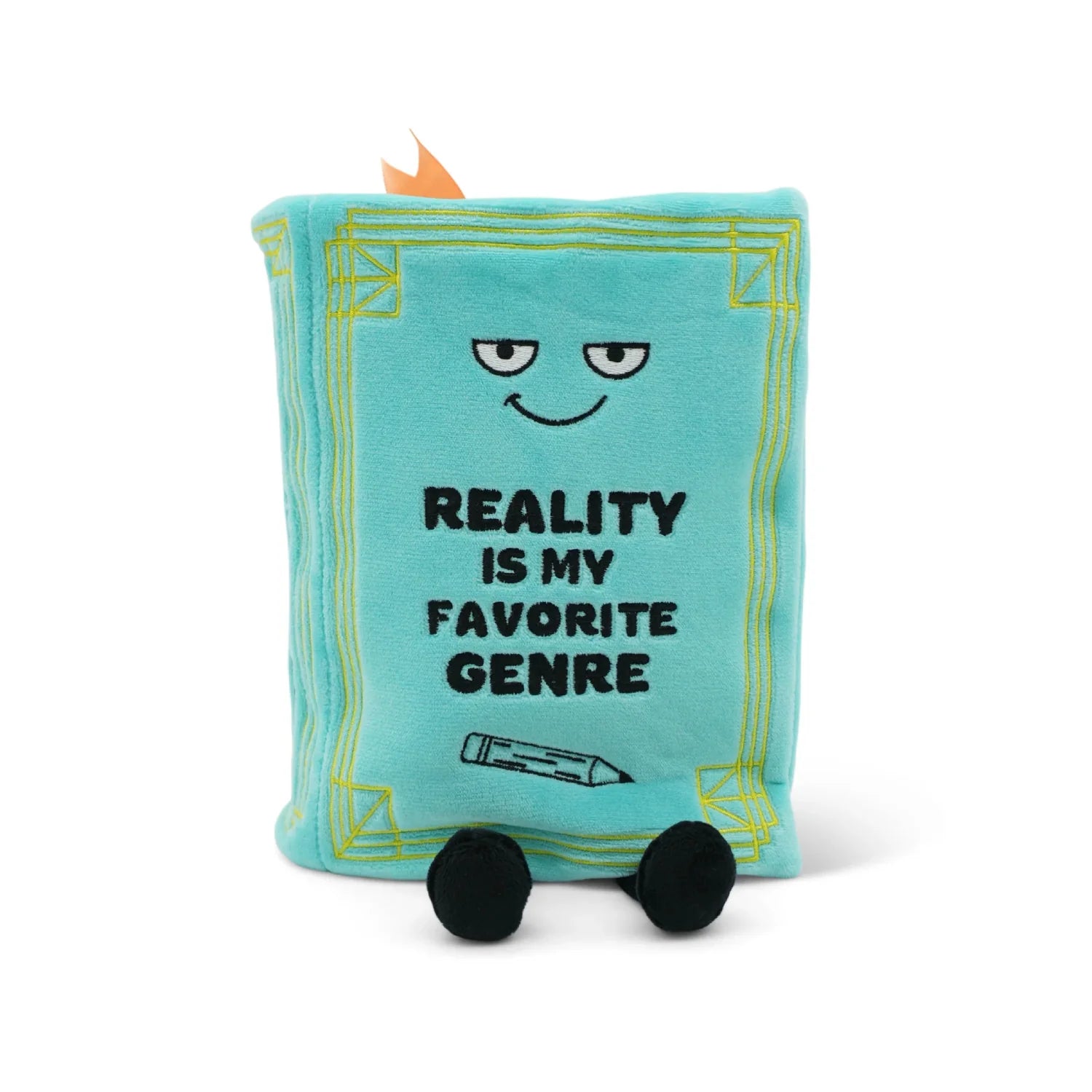 Plush toy book with text 'Reality is my favorite genre' on a white background