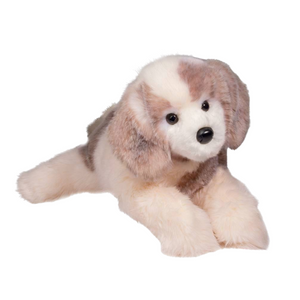 Plush toy dog with brown and white fur on a white background