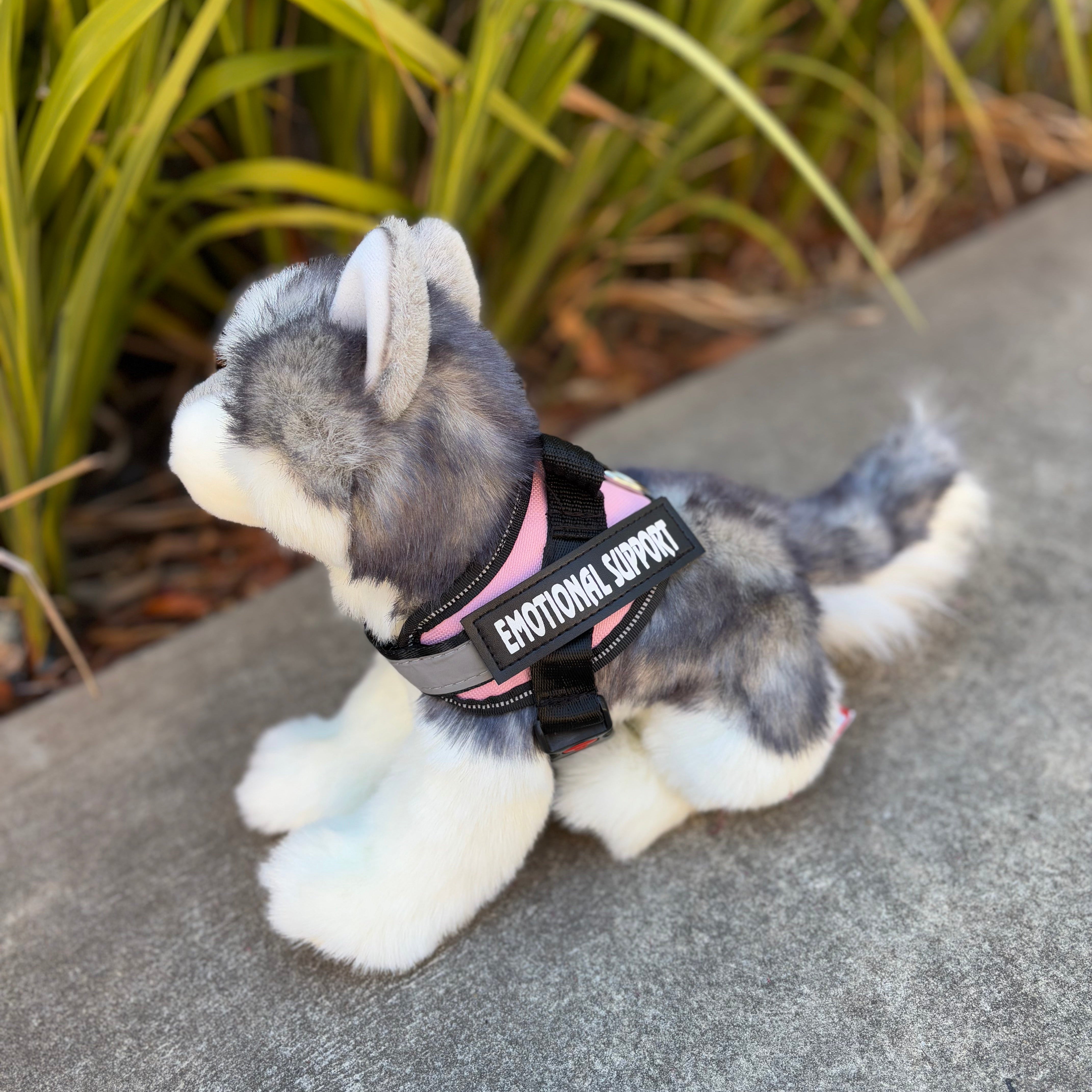 Sasha Husky by Douglas Dog Plush dog side view wearing a pink emotional support vest