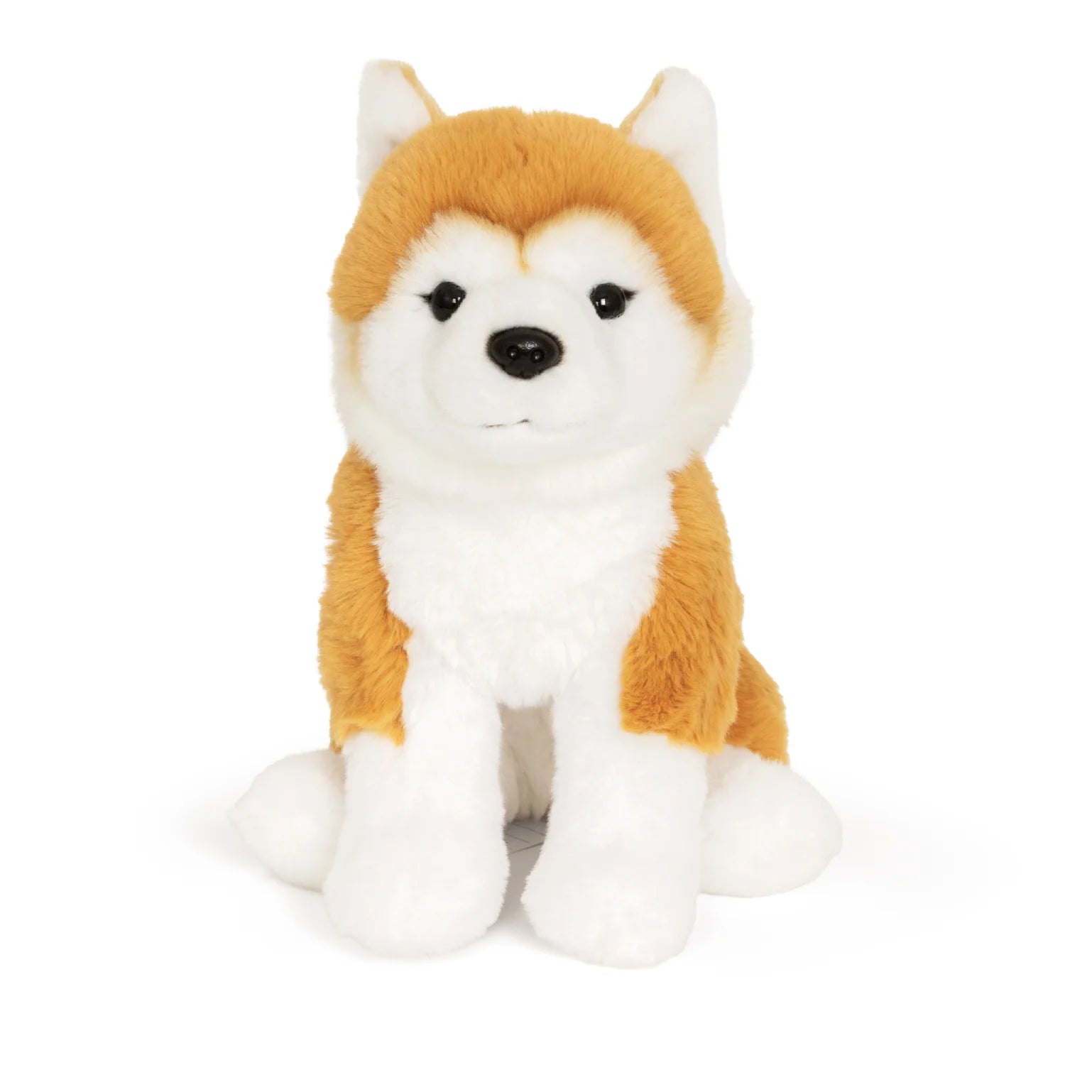 Plush toy resembling a dog with orange and white fur on a white background