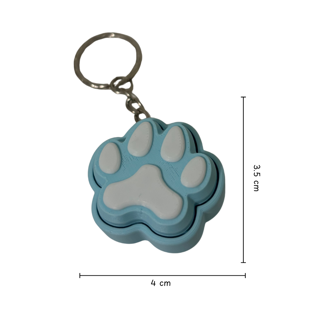 Blue paw-shaped keychain with dimensions on a white background