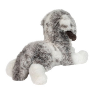 Plush toy dog with gray and white fur on a white background