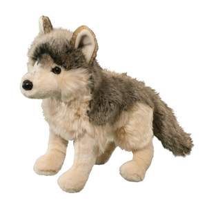 Plush toy wolf on a white background