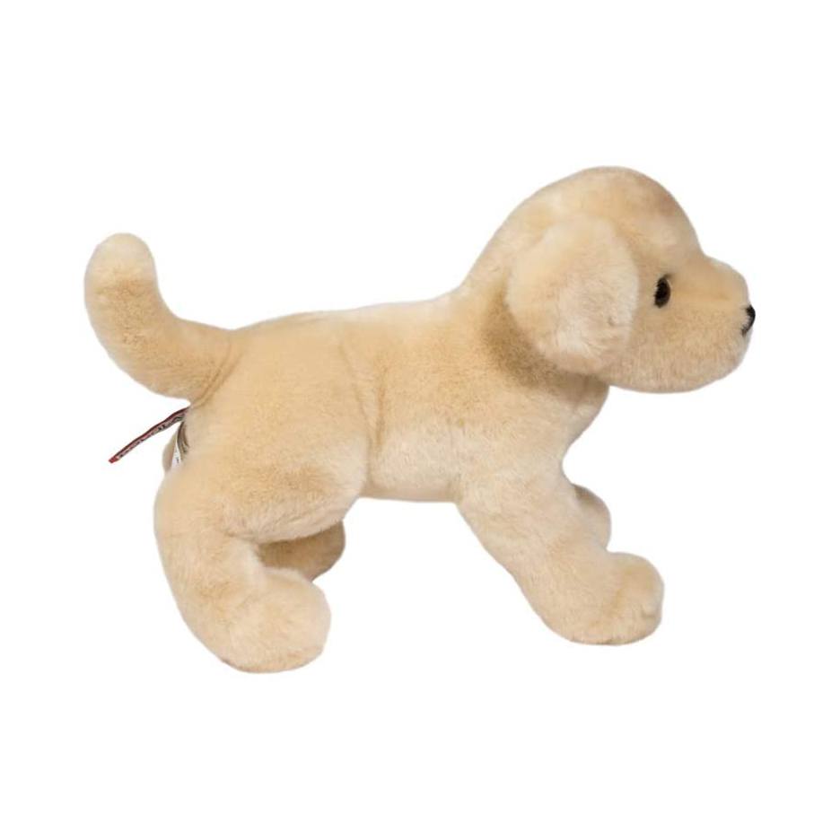 Beige plush dog toy on a white background