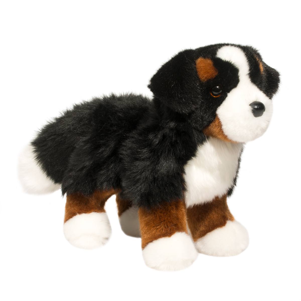 Plush toy resembling a Bernese Mountain Dog on a white background