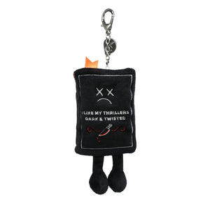 Black plush keychain with text and a knife graphic on a white background