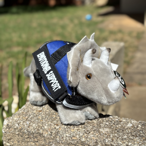 Triceratops dinosaur emotional support stuffed animal. Living Nature. ESSA gear. Blue emotional support vest