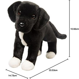 Black and white stuffed dog toy with measurements on a white background