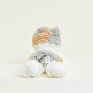 A plush stuffed animal toy shaped like a cat, photographed from the back against a clean, solid, warm off-white background. The cat features fluffy fur in white, light gray, and a soft peachy-orange color.