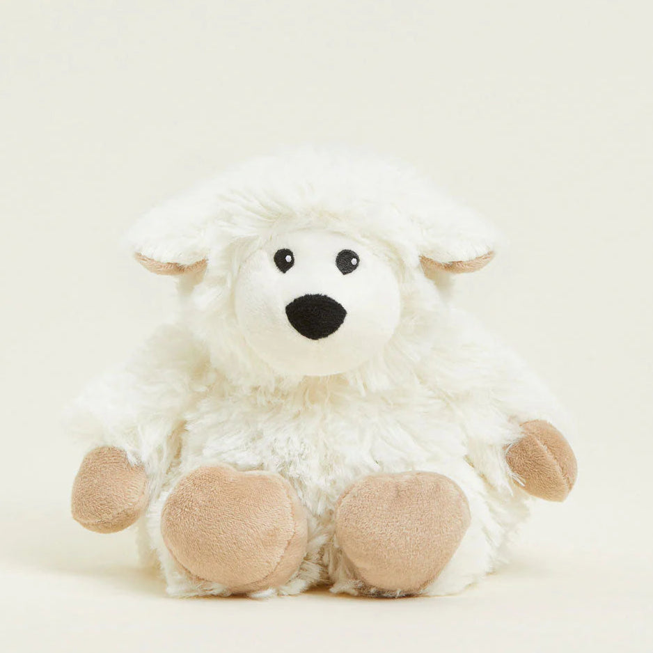 White plush toy with brown paws on a white background