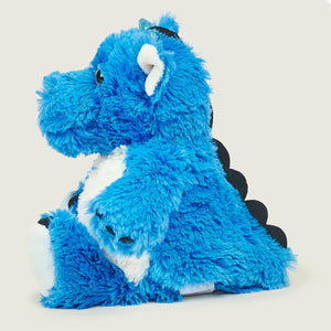A blue plush dinosaur toy with white accents and black spikes, sitting on a light beige background.