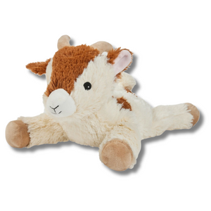 Plush toy goat on a white background